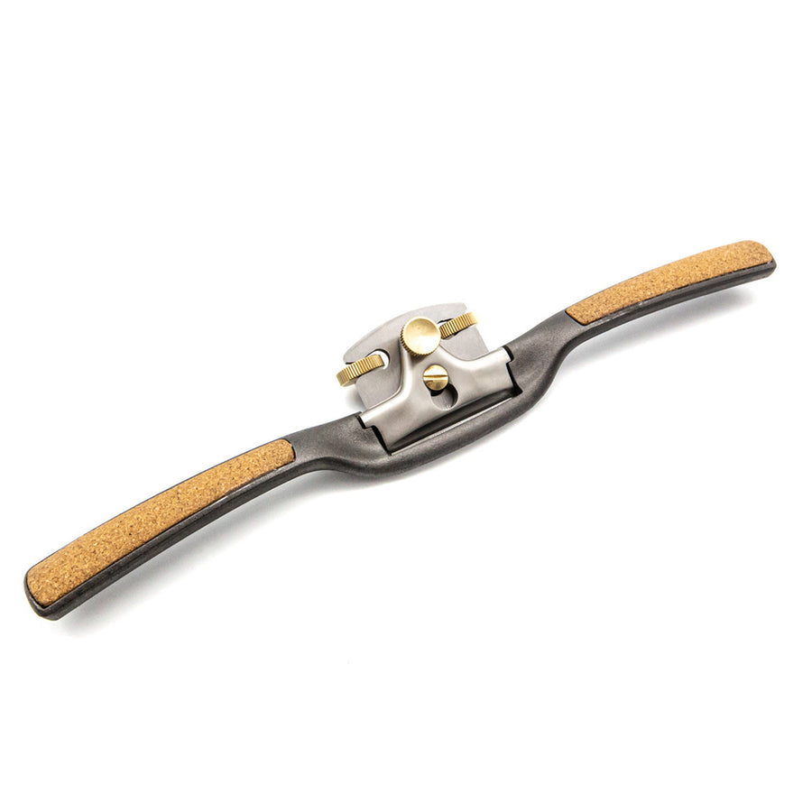 The Melbourne Tool Company's Spokeshave boasts wooden grips, a black metal body, and an adjustable blade for precise woodworking.