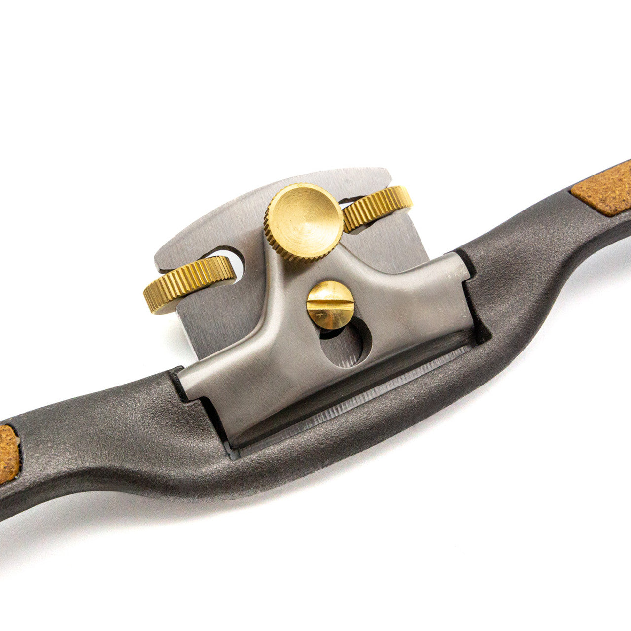 Close-up of a Melbourn Tool Company Spokeshave by Melbourne Tool Company, featuring adjustable brass knobs and a curved handle, ideal for precise woodworking tasks.