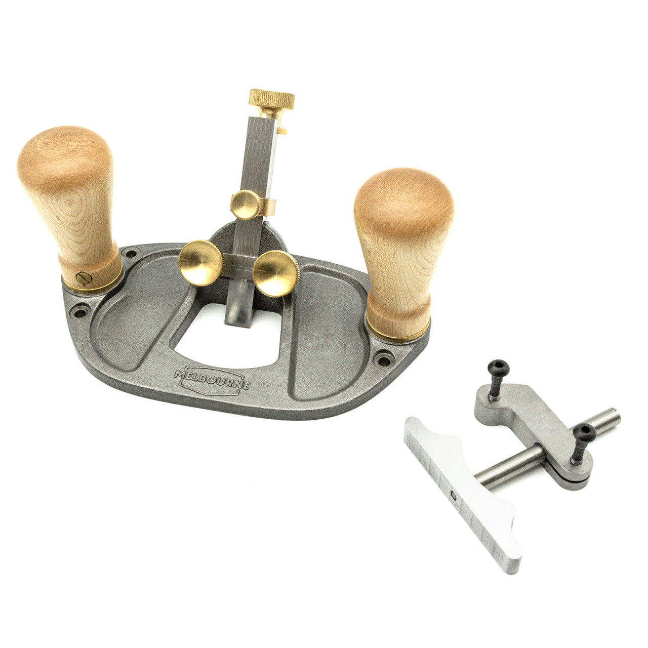 The Melbourne Tool Company offers the Melbourne Tool Router Plane, featuring elegant wooden handles and brass adjustment knobs. Ideal for detailed woodworking, this premium tool includes an adjustable grooving accessory for enhanced precision and versatility.