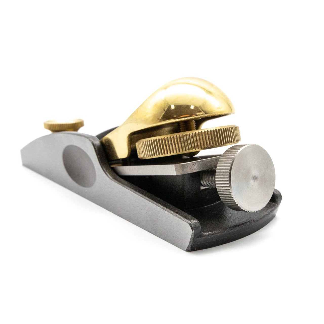 The Melbourne Tool Company’s Low Angle Block Plane features a bronze lever cap, an M2 High Speed Steel blade, and an adjustment knob, making it ideal for smoothing surfaces in woodworking.