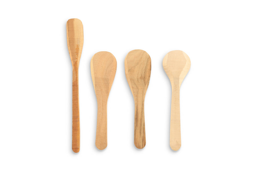 Four Wooden Spoon Carving Blanks by Ken Wise are beautifully arranged side by side against a white background, highlighting his expert craftsmanship.