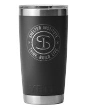 The Shelter Yeti Rambler Tumbler, a black insulated cup with a silver MagSlide lid, showcases the Shelter Institute logo and the tagline "Think. Build. Live." It features double-wall vacuum insulation for superior temperature retention.