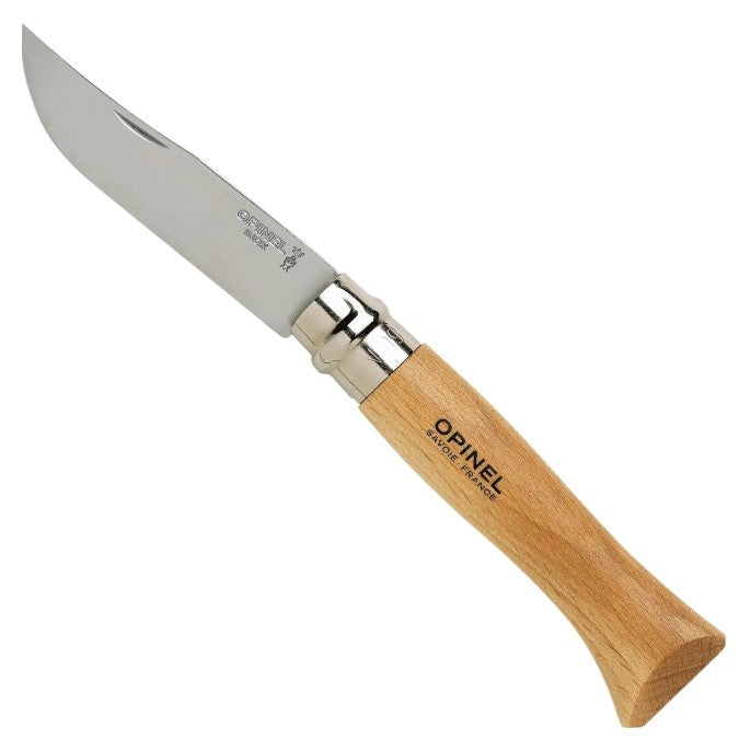 The No.09 Opinel Folding Knife boasts a wooden handle and a sharp carbon steel blade inscribed with "Made in France." Perfect for bushcraft, this reliable tool proudly embodies the Opinel brand's legacy.